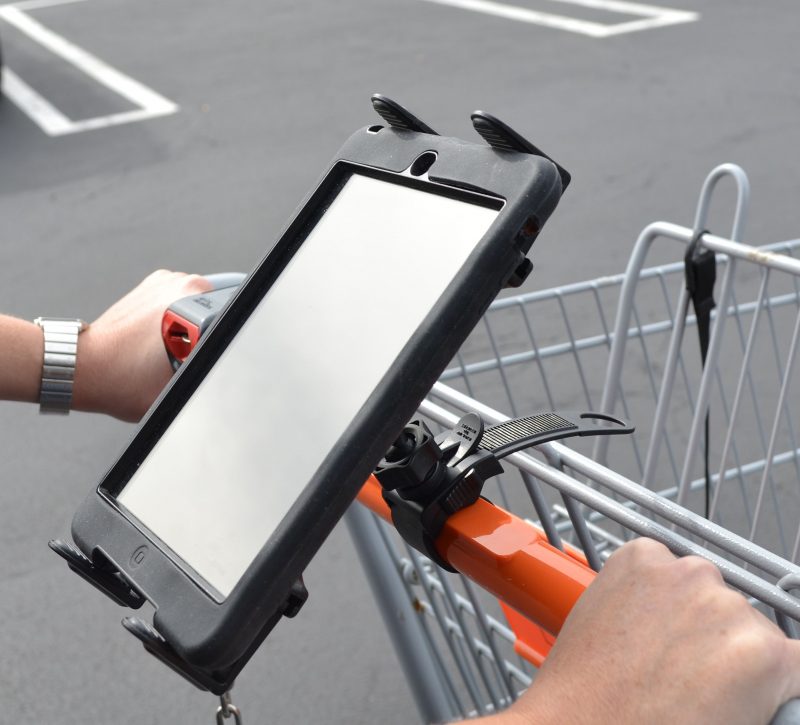 Tablet mounted on a shopping cart handle