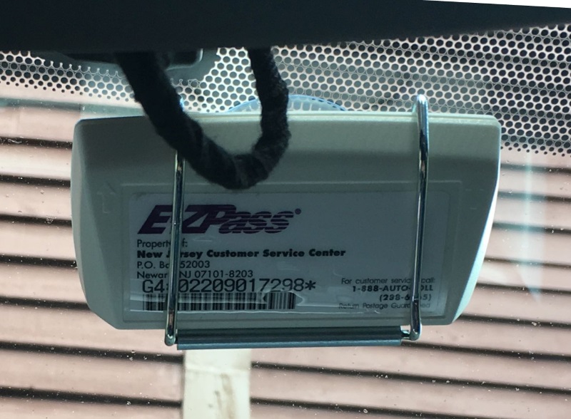 E-ZPass mounted on windshield near rearview mirror