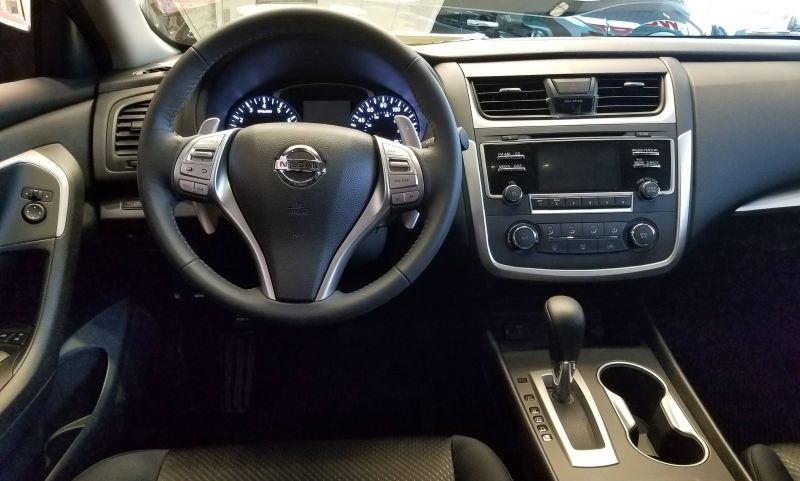 Interior of Nissan Altima showing phone mount locations