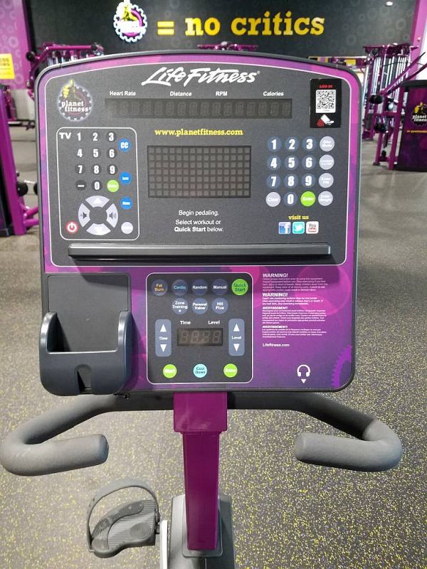 How do you use a stationary bike at Planet Fitness?