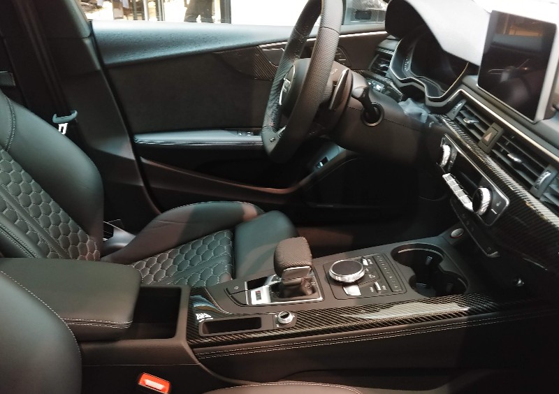 Audi RS5 interior showing center console and MMI display