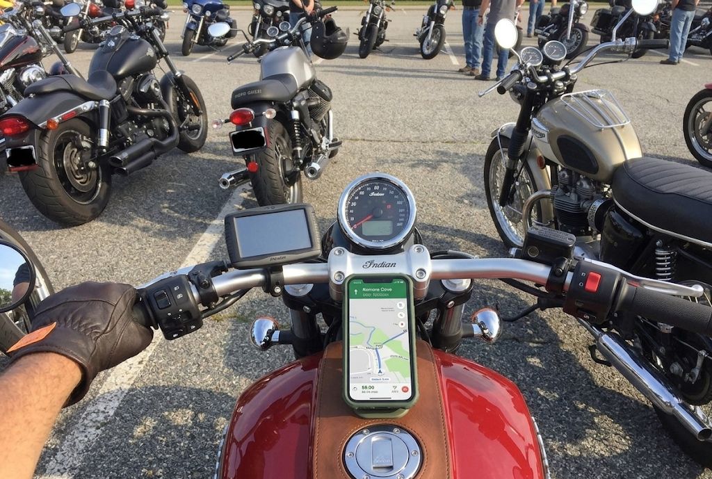 Motorcycle gas tank with phone mount installed