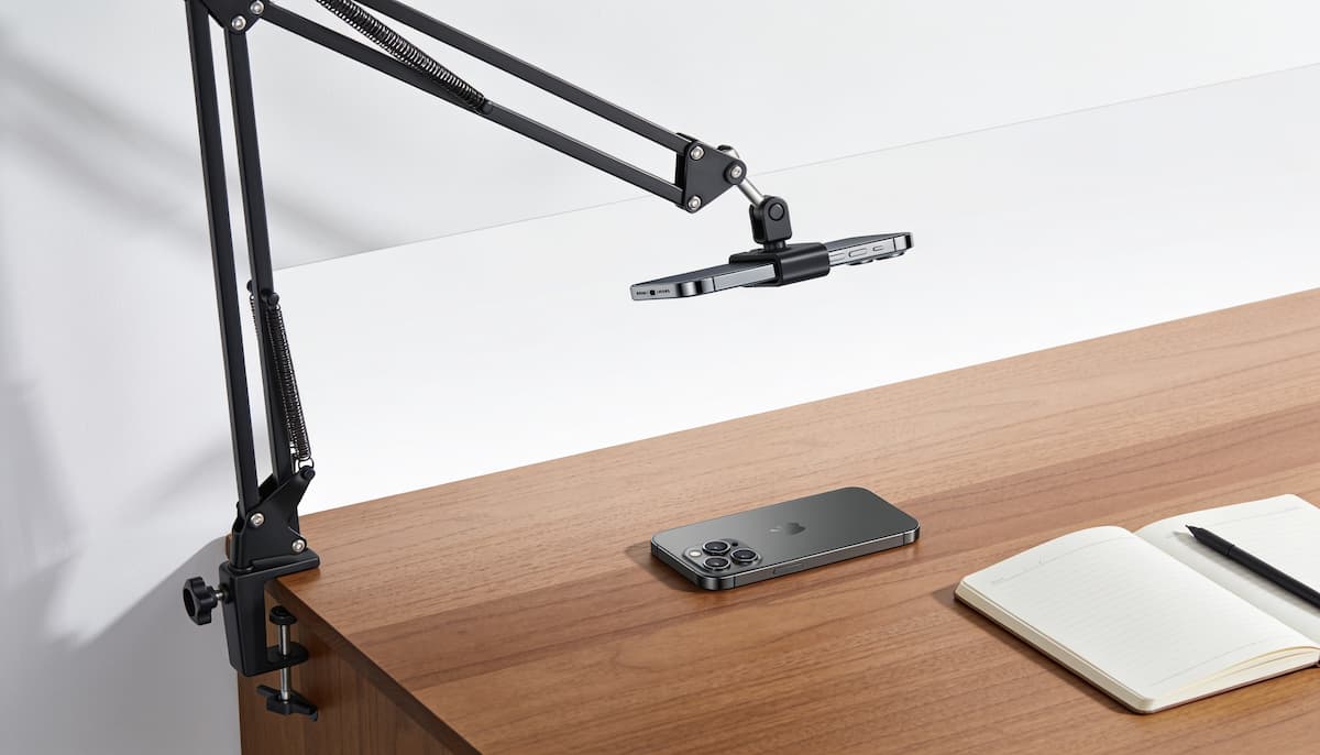 overhead phone mount boom arm desk hero Overhead phone mount and periscope-style boom arm positioned for top-down filming
