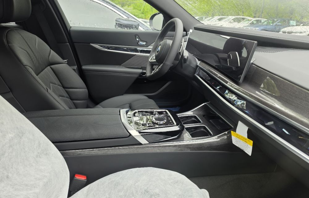 BMW 7 Series interior showing dashboard and infotainment screen