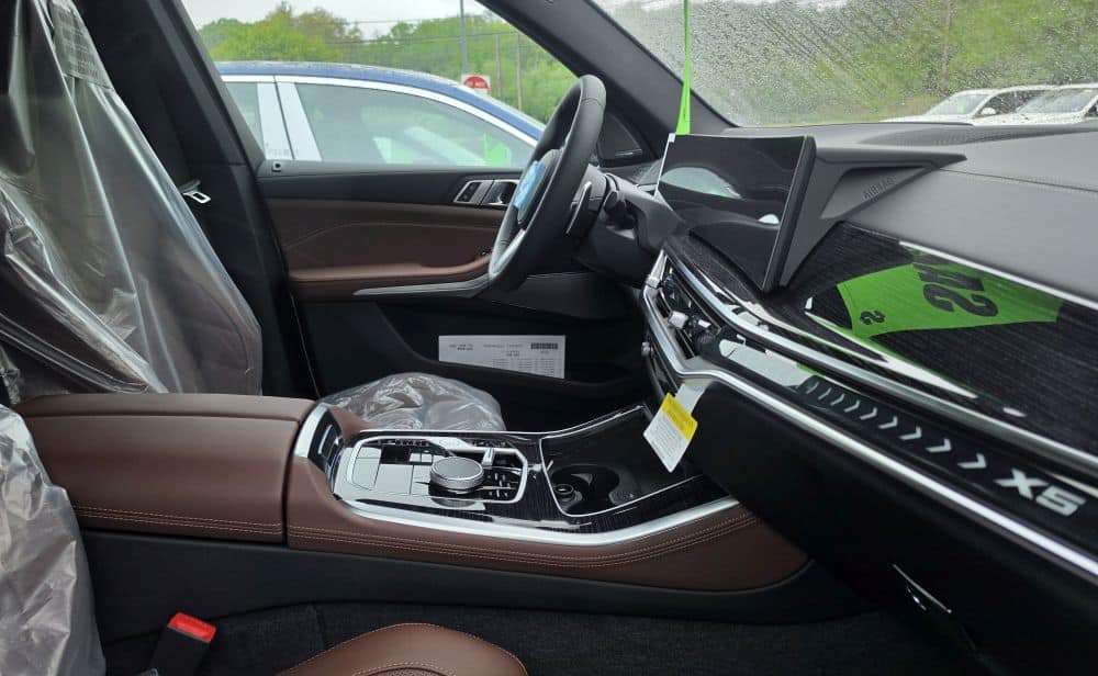 BMW X5 interior showing dashboard and infotainment screen