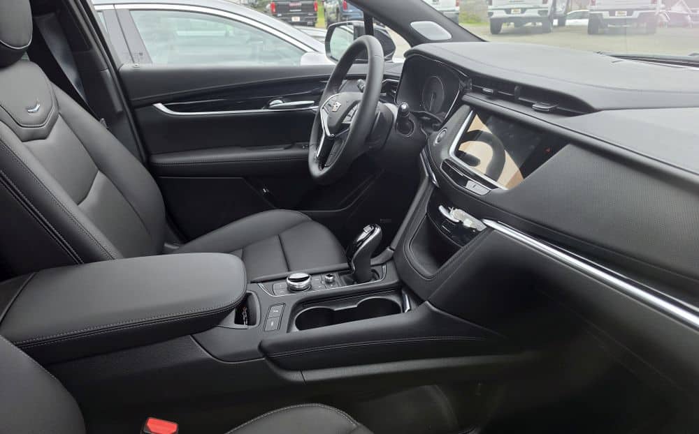 Cadillac XT5 interior showing dash and vent layout for phone mounting