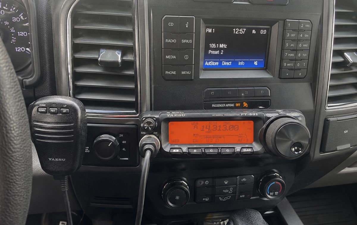 HAM radio with microphone mounted in a car