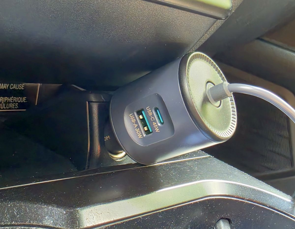 JOYROOM Starlink Mini car adapter plugged into a vehicle 12V socket