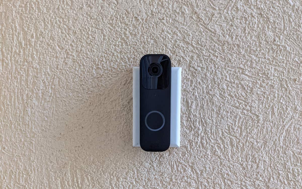 Blink doorbell mount installed at an angle beside an entry door